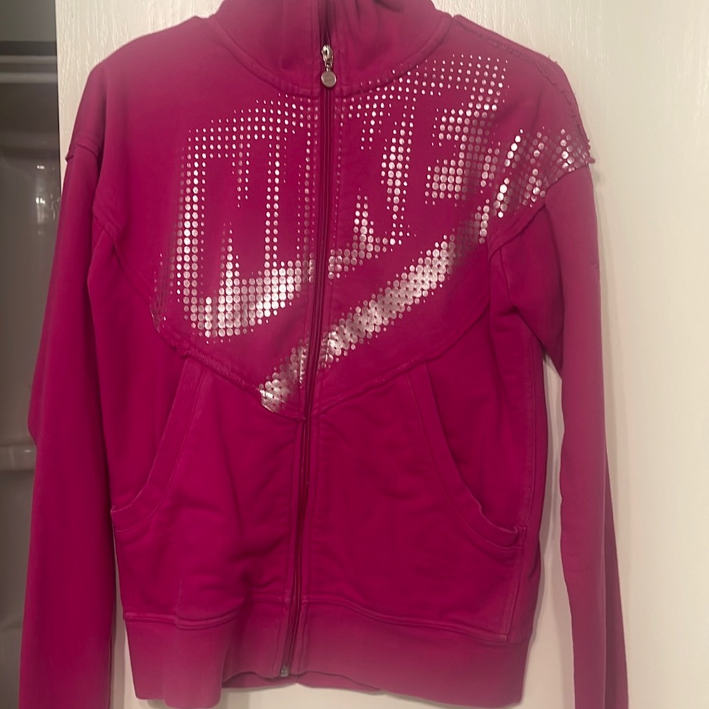 Pink size L (12-14) youth Nike zip up sweater.